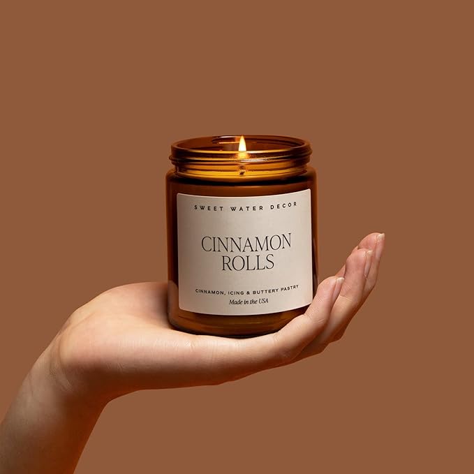 Sweet Water Decor Cinnamon Roll Candle - Fall Candle with Cinnamon, Icing & Buttery Pastry for Home - Soy Candles with 40 Hours Burn Time - 9Oz Black Lid Amber Jar Holiday Scents
