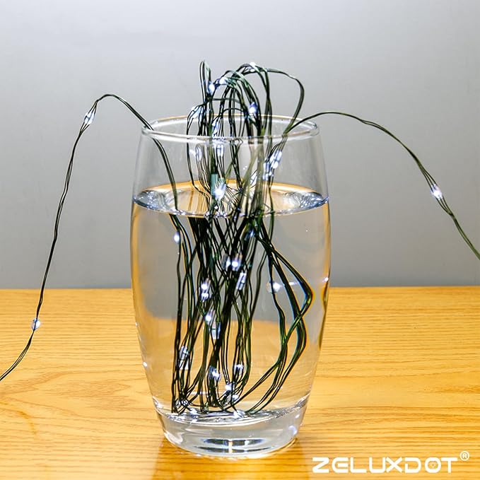 Fairy Lights Plug in,200FT 600LEDs Waterproof Led String Lights,8 Modes Remote Twinkle Light for Outdoor Indoor Christmas Wedding Birthday Garden Party Decorations,Green Wire,Cool White