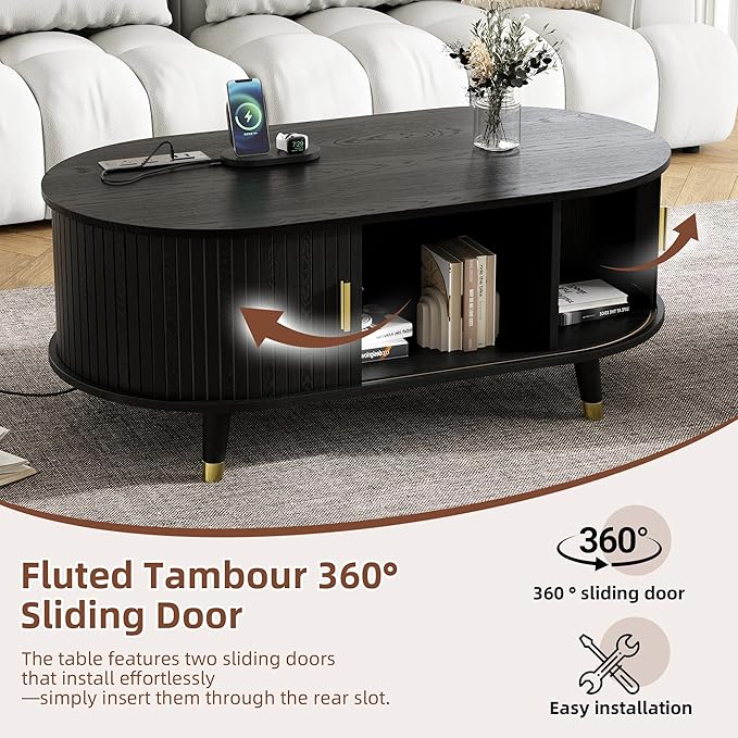 WILLIAMSPACE 42.5" Oval Coffee Table with Storage & Charging Station, Mid-Century Modern Center Table with Sliding Tambour Door, Farmhouse Tea Table with Solid Wood Legs for Living Room, Black