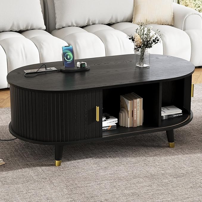 WILLIAMSPACE 42.5" Oval Coffee Table with Storage & Charging Station, Mid-Century Modern Center Table with Sliding Tambour Door, Farmhouse Tea Table with Solid Wood Legs for Living Room, Black