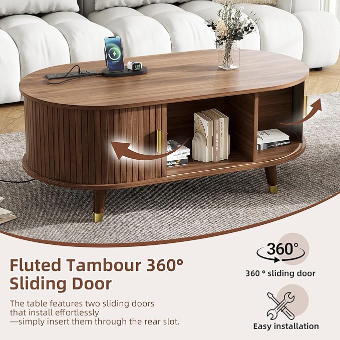 WILLIAMSPACE 42.5" Oval Coffee Table with Storage & Charging Station, Mid-Century Modern Center Table with Sliding Tambour Door, Farmhouse Tea Table with Solid Wood Legs for Living Room, Walnut